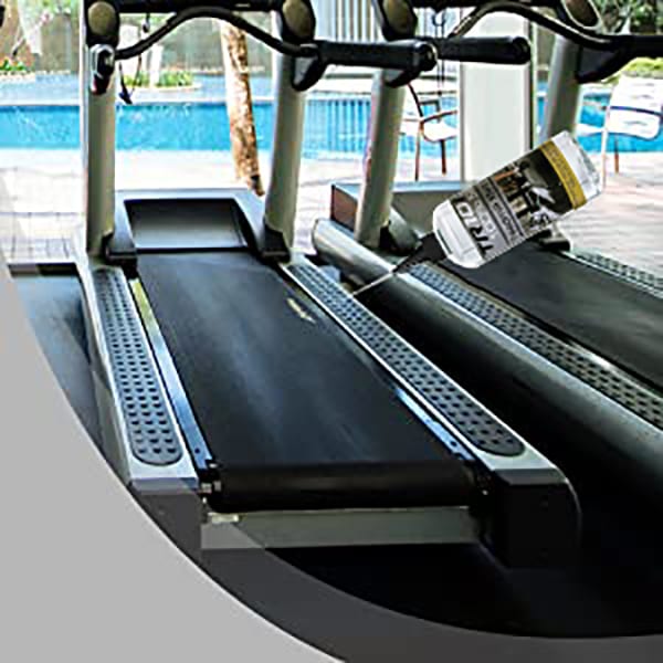 750ml Treadmill Silicone Oil being applied to a Treadmill Belt